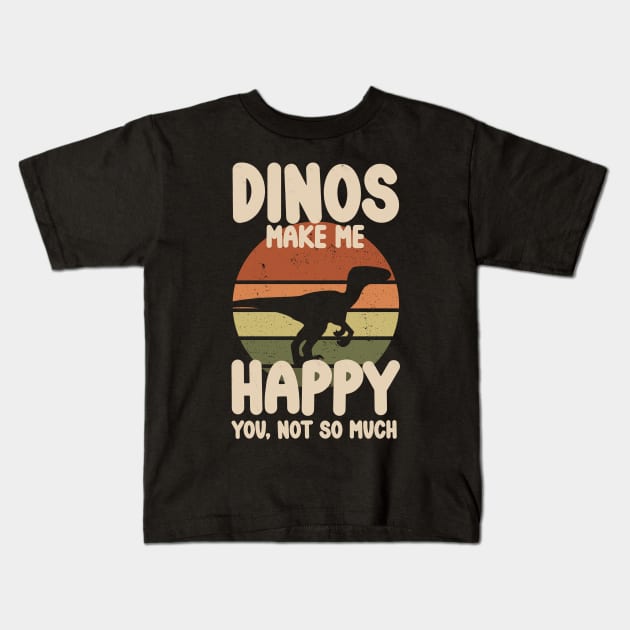 "Dinos Make Me Happy" Raptor Dinosaur Sunset Kids T-Shirt by CharlieCreates